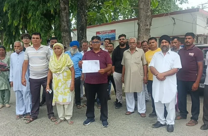सीएम का नाम लेकर जमीन बेचने का दबाव? रुद्रपुर में किसानों ने उद्योगपति पर लगाए गंभीर आरोप